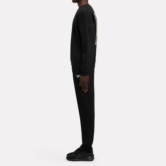 Trenerka të poshtme Reebok ANDRE SMALL LOGO CUFFED PANT