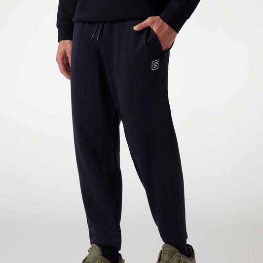 Trenerka të poshtme GUESS MENTORE CUFFED PANT