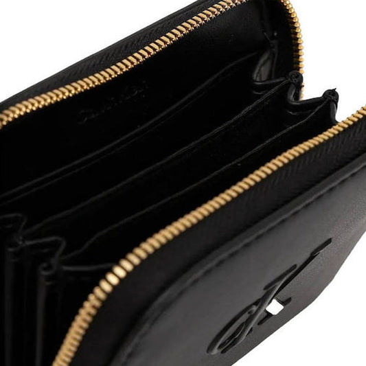 Kuletë CALVIN KLEIN RAISED CK MEDIUM ZIP AROUND