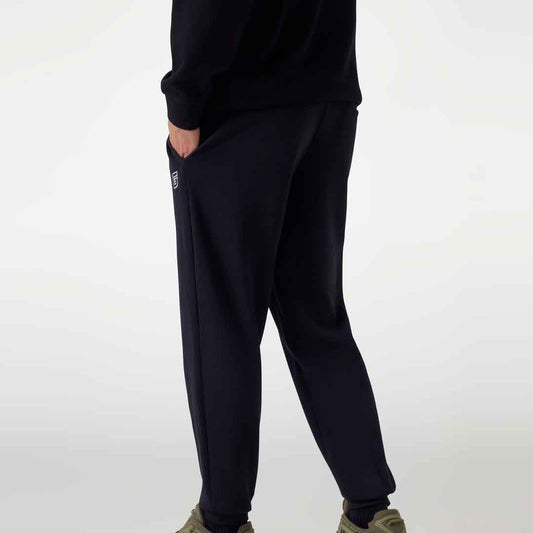 Trenerka të poshtme GUESS MENTORE CUFFED PANT