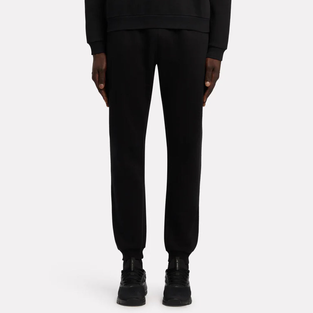 Trenerka të poshtme Reebok ANDRE SMALL LOGO CUFFED PANT