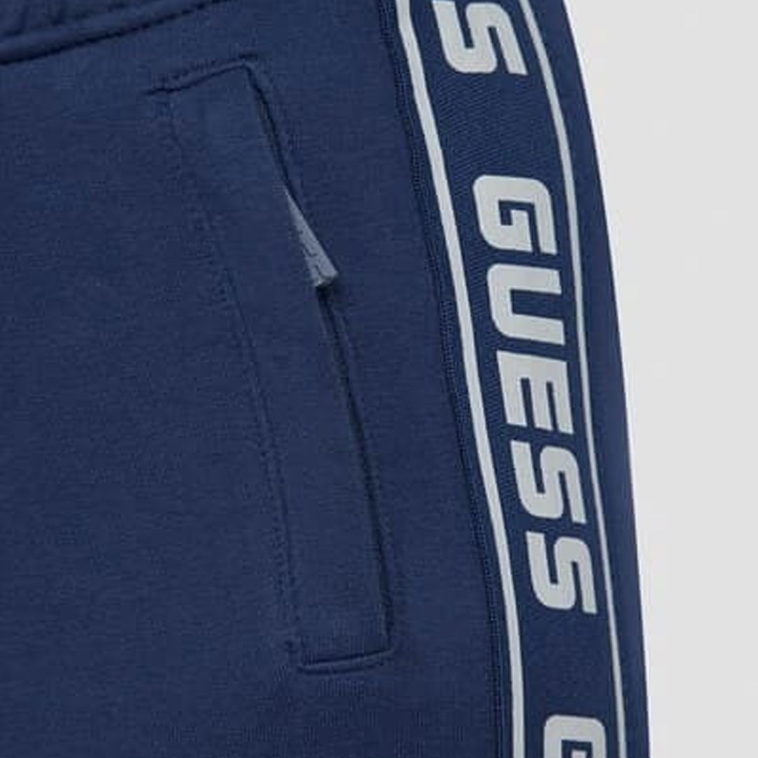 Trenerka të poshtme Guess REGUALR ACTIVE PANTS