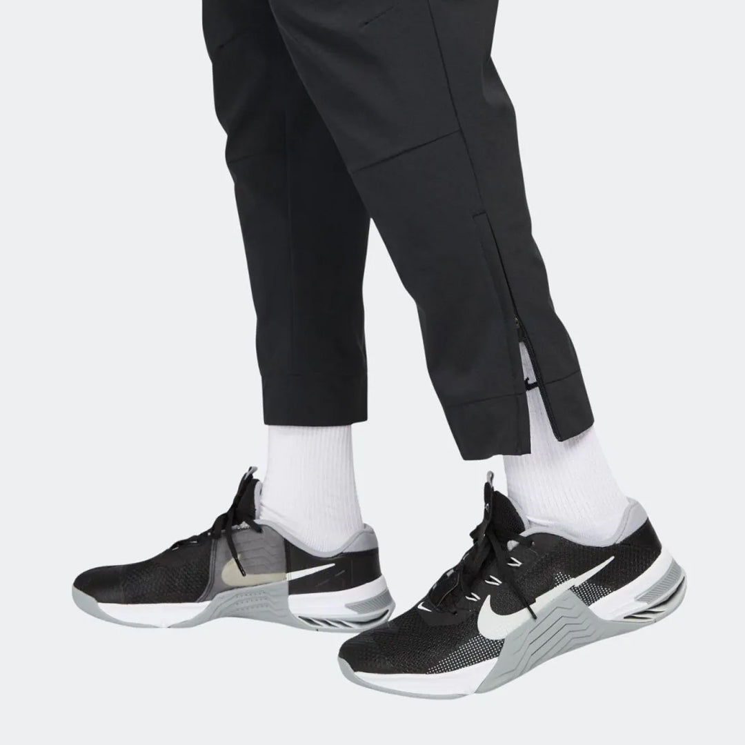 Trenerka të poshtme Nike M NK DF UNLIMITED PANT TP